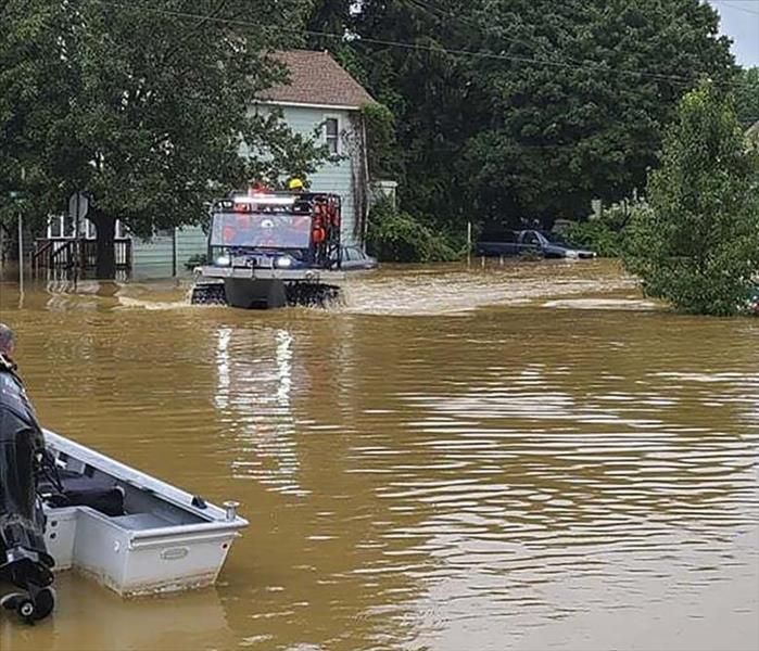 Houses and streets are flooded after a major storm.